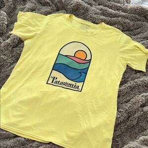 Patagonia Yellow Short Sleeve Tee with Sunset Wave Graphic